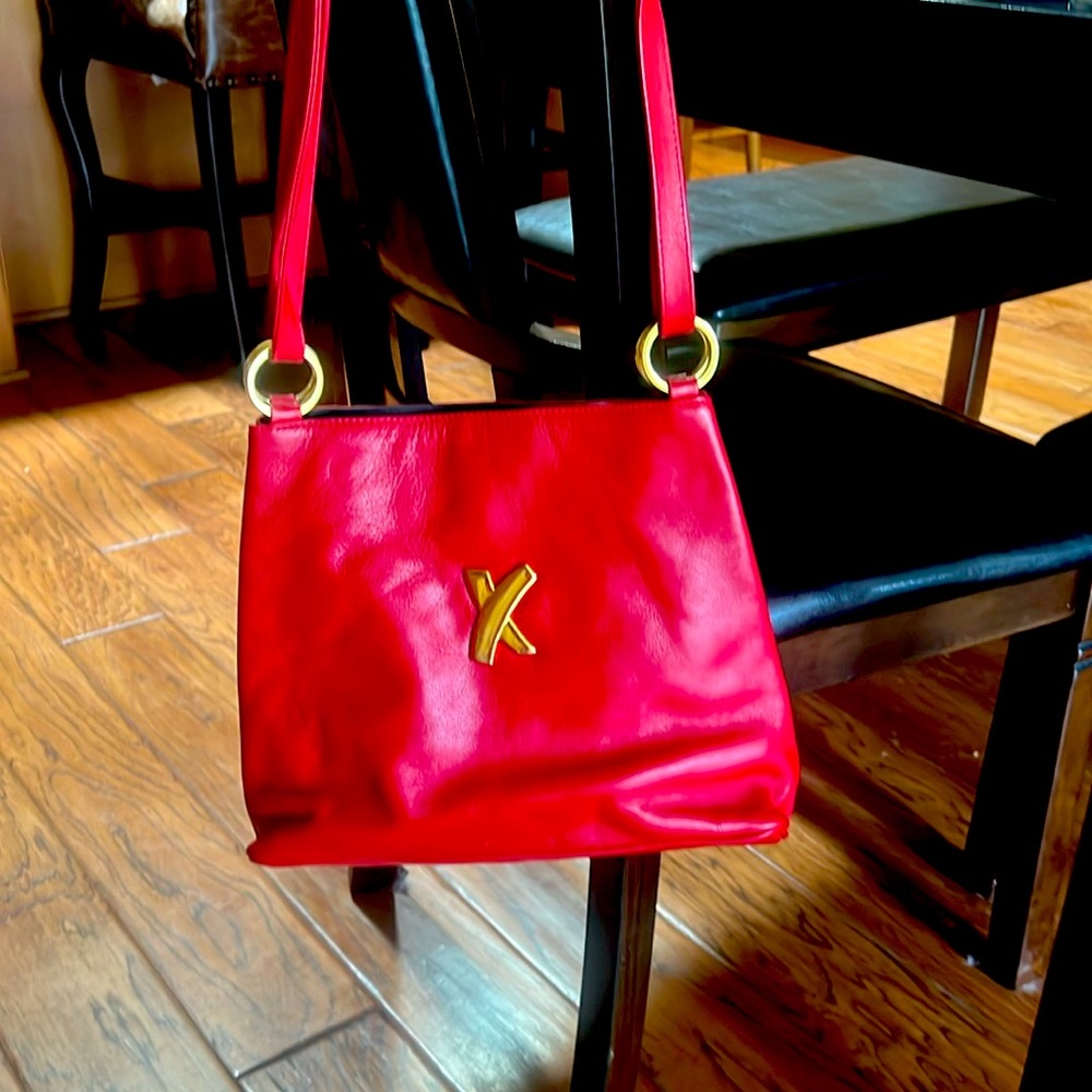 Barely used Paloma Picasso shoulder bag with dust cover